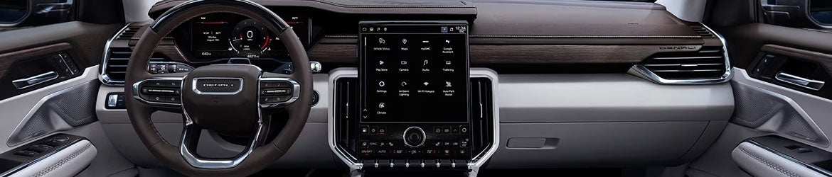 2026 GMC Acadia infotainment system display in Garden City Park NY showing navigation and connectivity features with Google built-in
