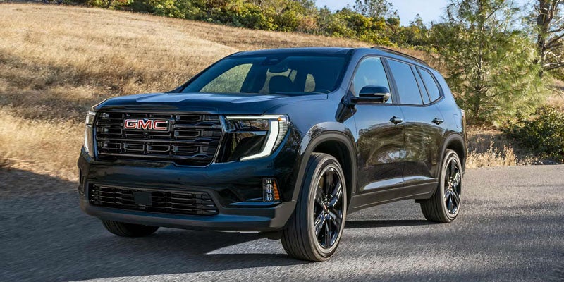 Front view of 2026 GMC Acadia grille design in Garden City Park NY showcasing bold GMC styling on Long Island roads