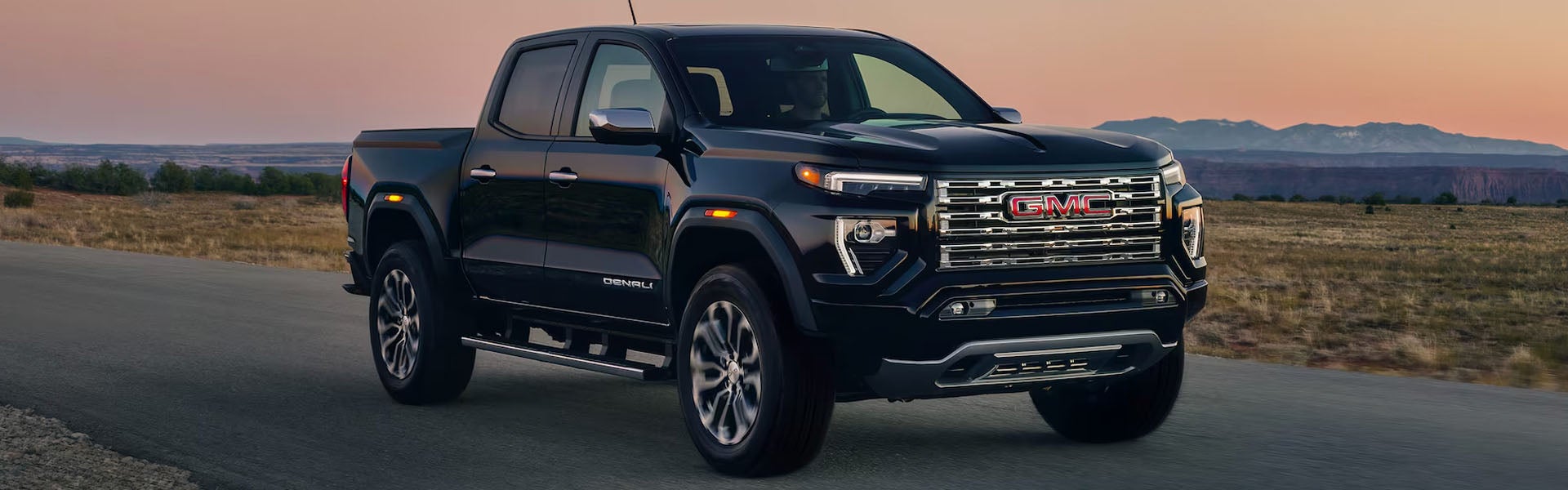 2026 GMC Canyon infotainment system in Garden City Park NY displaying 11.3-inch touchscreen with navigation and connectivity features