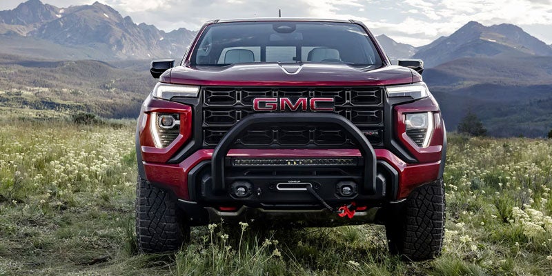 Front view of 2026 GMC Canyon grille design in Garden City Park NY highlighting bold GMC styling and rugged truck presence