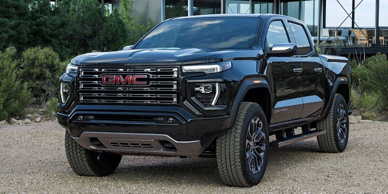 2026 GMC Canyon interior technology in Garden City Park NY with 11.3-inch touchscreen, wireless Apple CarPlay and Android Auto, and advanced camera views
