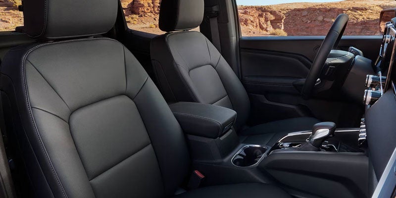 2026 GMC Canyon spacious interior in Garden City Park NY featuring premium seating, Denali leather trim, and driver-focused cabin design
