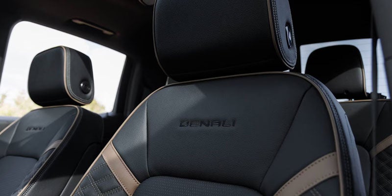 2026 GMC Canyon Denali interior headrest in Garden City Park NY with premium leather seating and luxury stitching detail