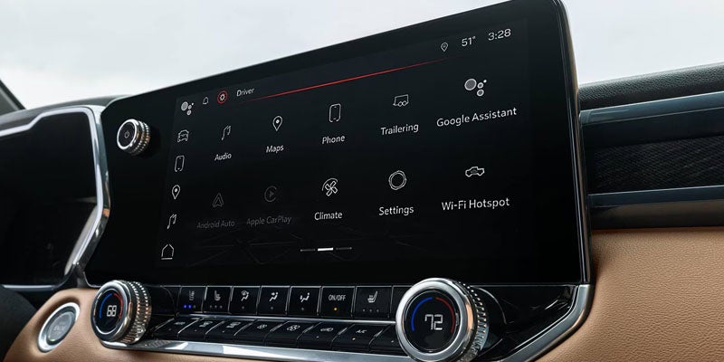 2026 GMC Canyon in Garden City Park NY showing GMC Pro Safety features including lane keep assist and automatic emergency braking on Long Island roads