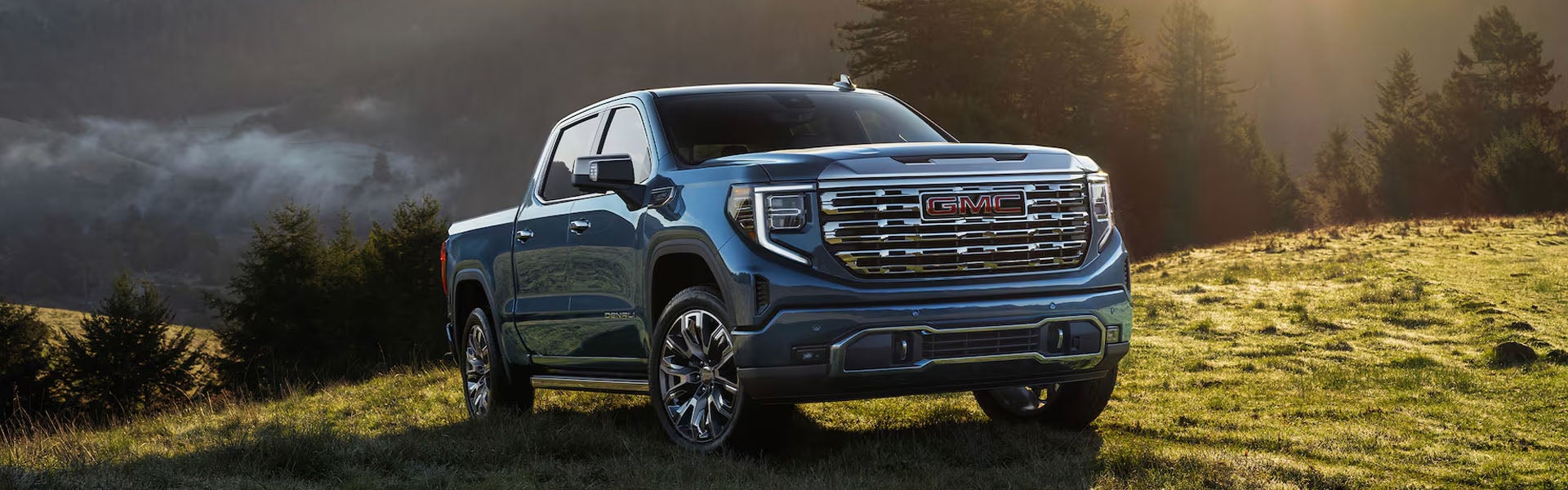 2026 GMC Sierra 1500 infotainment system in Garden City Park, NY featuring a 13.4-inch touchscreen with Google built-in services, Apple CarPlay®, and Android Auto® for seamless connectivity and media control.