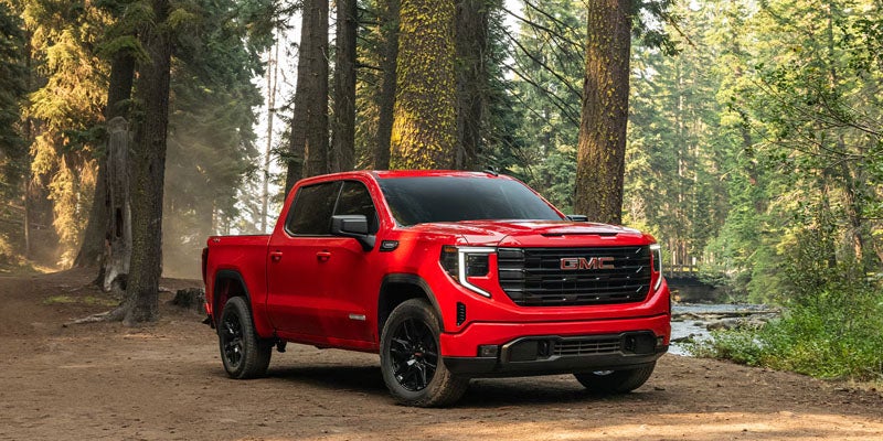 2026 GMC Sierra 1500 trim levels in Garden City Park, NY including Pro, SLE, Elevation, SLT, AT4, AT4X, Denali, and Denali Ultimate, offering various features for work and leisure.