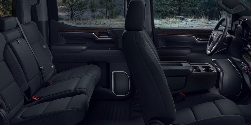 Interior of the 2026 GMC Sierra 1500 in Garden City Park, NY with luxurious leather seats, high-quality materials, and a Bose Premium Series sound system for premium comfort.